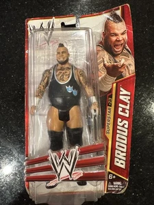 Mattel WWE Superstar #23 Brodus Clay BASIC Action Figure NUOVO confezione danneggiata - Foto 1 di 16