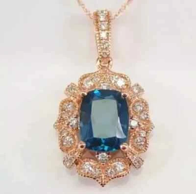 Colgante de topacio azul Londres de 2,00 quilates corte esmeralda creado en laboratorio enchapado en oro rosa de 14 quilates Foto 1 de 4