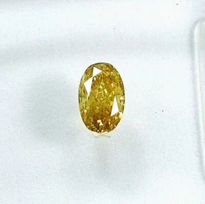A IGI Certified Sealed Diamond - 0.26 Carat Oval- VS1 Fancy Orangy Yellow - Picture 1 of 9