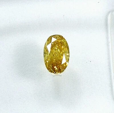 A IGI Certified Sealed Diamond - 0.26 Carat Oval- VS1 Fancy Orangy Yellow - Image 1 of 4