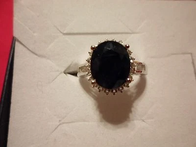 Anillo ovalado de zafiro azul con detalles de topacio blanco talla 7-4,87 quilates Foto 1 de 4