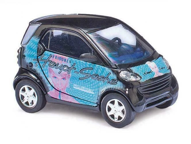 Busch 46199 - 1/87 Smart City Coupè - Parrucchiere - Nuovo - Immagine 1 di 1
