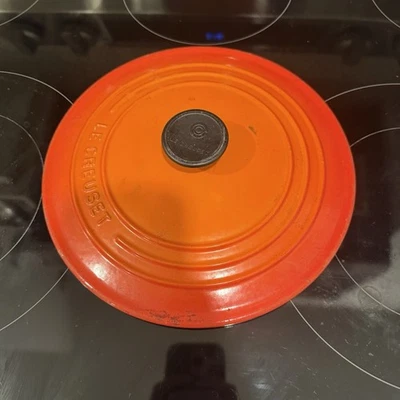 LE CREUSET #22 3.5 Qt Round Dutch Oven 3-1/2 Quart "LID ONLY" Orange Flame - Image 1 of 4