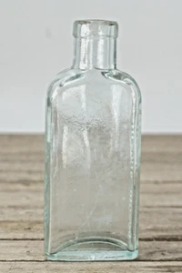 3 In One Oil Co Bottle Aqua Glass 1910s Cork Top /no cork Vintage Manganese Glow - Picture 1 of 8