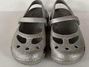 Crocs Girl’s Size 10 Shayna Mary Jane Sandals Slip on Flat Shoes Silver Glitter