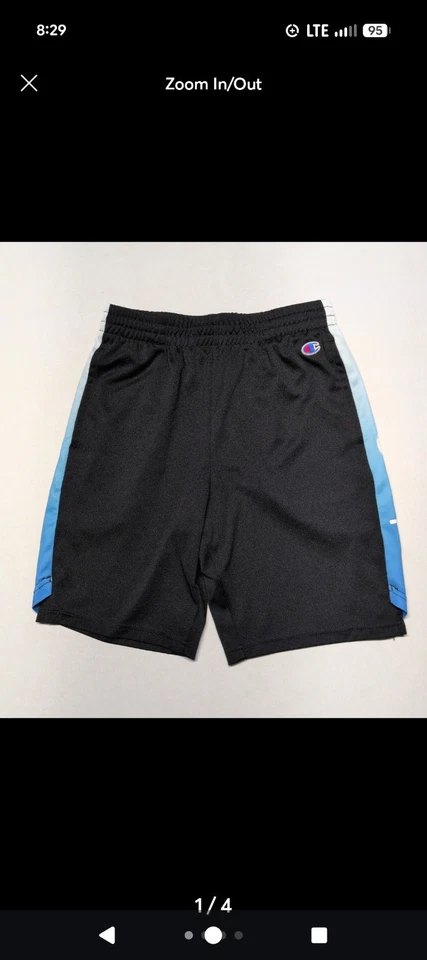Pantalones cortos deportivos Champion negros y azules para niños talla grande. Foto 1 de 4
