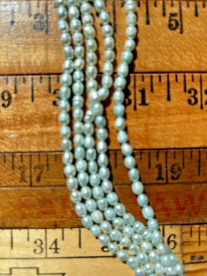 Freshwater Pearls Seafoam Green Rice 4mm X 5 mm  16" Strands - Image 1 of 2