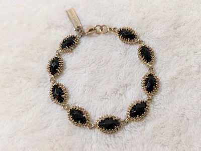 Pulsera Kendra Scott Estación Marquesa Tono Dorado Negro Piedras Facetadas Ajustable Foto 1 de 4