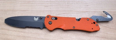 Cuchillo Plegable Benchmade Triage 916SBK-ORG Punta Roma Mango Naranja Cortador de Cinturón Foto 1 de 4