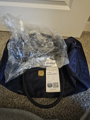 Bolso de lona MCM para hombre Foto 1 de 4