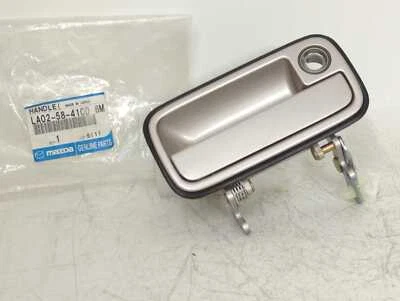 Nueva manija de puerta exterior genuina OEM 1993-1995 Mazda MPV LA02-58-410D6M derecha  Foto 1 de 4