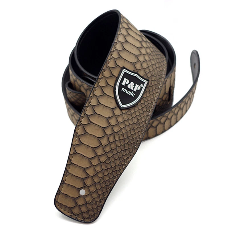 Correa de guitarra ajustable de cuero PU en relieve para bajo eléctrico acústico Foto 1 de 4