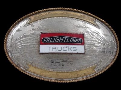 RL15168 VINTAGE AÑOS 70 **CAMIONES FREIGHTLINER** ANUNCIO HEBILLA DE PLATA ALEMANA Foto 1 de 2