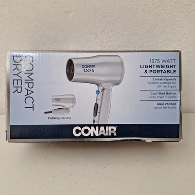 ¡NUEVO! Secador de pelo con mango plegable compacto de doble voltaje Conair 1875 vatios Foto 1 de 4