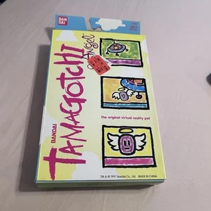 Vintage Original 1997 Tamagotchi Angel Silver Giga Pet NRFB Light Blue/gray - Picture 1 of 6
