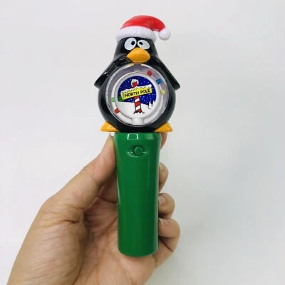 Coolites Penguin North Pole Light Up Toy Spinner 6" Green Black Christmas Hat - Image 1 of 4