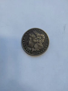 Is 1881 Morgan silver dollar no mint mark - Picture 1 of 7