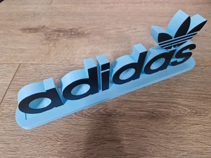 Adidas Original Azul Hielo - Cartel Colección Exhibición Tienda 3D Exhibición Coleccionistas  - Imagen 1 de 3