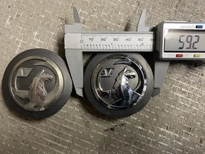 2x Vauxhall 59mm wheel centre caps. 13347293 # JL743 - Picture 1 of 2