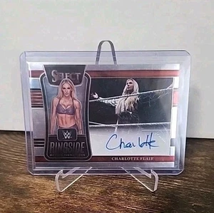 2022 Panini Select WWE Ringside Action Signatures Charlotte Flair #RA-CFL Auto - Bild 1 von 2