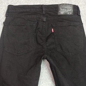 Pantalones de mezclilla Levis 519 Extreme-Skinny para hombre W29 L30 (etiqueta: W30 L32) negros ajustados elásticos - Imagen 1 de 12