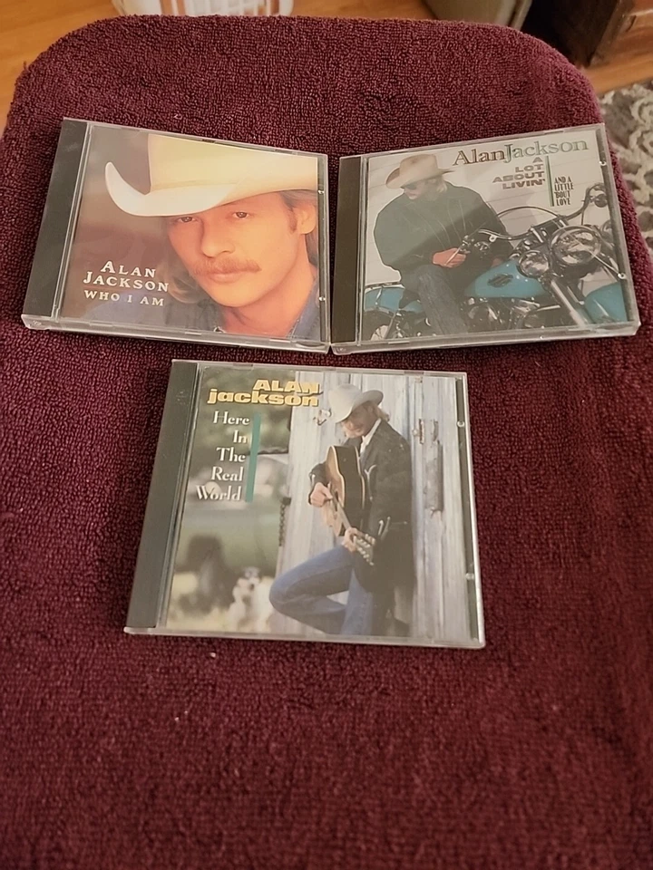 ALAN JACKSON:LOT OF 3 Here In The Real World Who I Am A Lot About Livin - Image 1 of 1