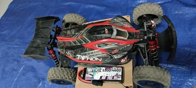 Buggy Arrma 1/8 TYPHON 6S V5 4X4 BLX com Spektrum Firma RTR, preto ARA8606V5 - Imagem 1 de 4