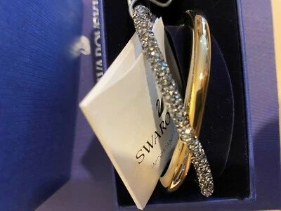 Brazalete cruzado Swarovski Crystaldust, gris, chapado en tono dorado Foto 1 de 3