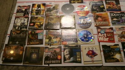Lote de 31 juegos de ordenador PC CD-ROM DVD Call Of Duty FEAR Battlefield y más. Foto 1 de 4