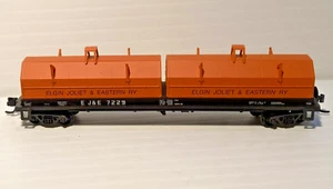 EJ&E.  N Scale.  Evans 48' Coil Car - RTR. Red Caboose. R/N: 7229. As New. - Picture 1 of 3