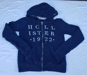 Hollister Gráfico Cremallera Azul Sudadera con Capucha Forrada Para Mujer XS LIQUIDACIÓN - Imagen 1 de 8
