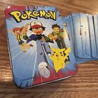 Vintage Pokémon 1999 playing card and collector tin used