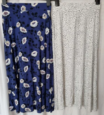 Marks & Spencer Jersey A Line Blue Floral or White & Black Spot Skirt - Image 1 of 4
