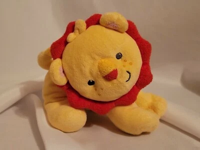 León Rojo Amarillo Arrugado Bebé Sonajero Ojos Negros Fisher Price Peluche 7" Juguete Lovey Foto 1 de 2