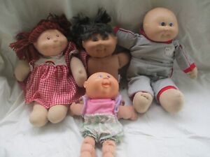 A Heavenly Kids Doll and 3 Cabbage patch Kids Dolls