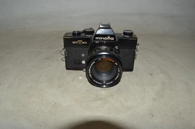 Cuerpo de cámara Minolta SRT201 35 mm negro con lente 50 mm F/1,7 Foto 1 de 4