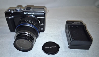 Cámara Olympus PEN E-PL1 con lente M.Zuiko Digital 14-42mm F3.5-5.6, batería, etc. Foto 1 de 4