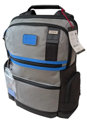 Mochila Tumi Parrish de cuero recortada azul y gris NUEVA nueva con etiquetas precio de venta sugerido por el fabricante $450 TSA Foto 1 de 4