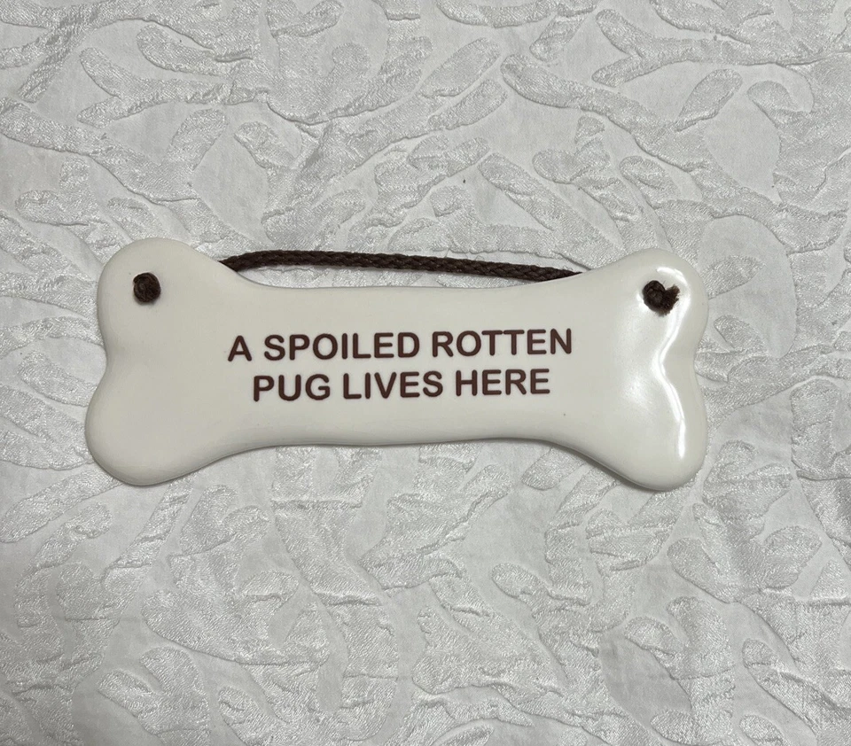 A SPOILED ROTTEN PUG LIVES HERE ceramic dog bone shape - Image 1 of 4