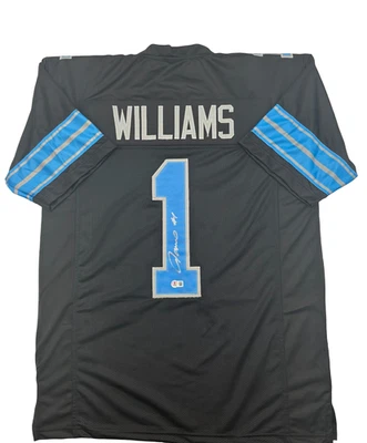 Camiseta de fútbol Beckett negra autografiada por Jameson Williams de los Detroit Lions personalizada Foto 1 de 2