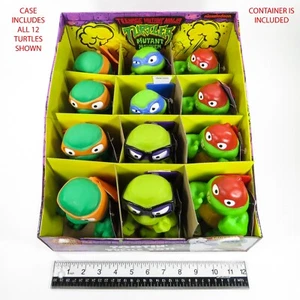 Teenage Mutant Ninja Turtles TMNT Tootin' Turtle Tots 12er Pack inklusive Hülle - Bild 1 von 24