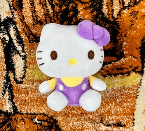 "Mini traje Sanrio Hello Kitty suave de 4"" con lazo púrpura amarillo púrpura" - Imagen 1 de 2