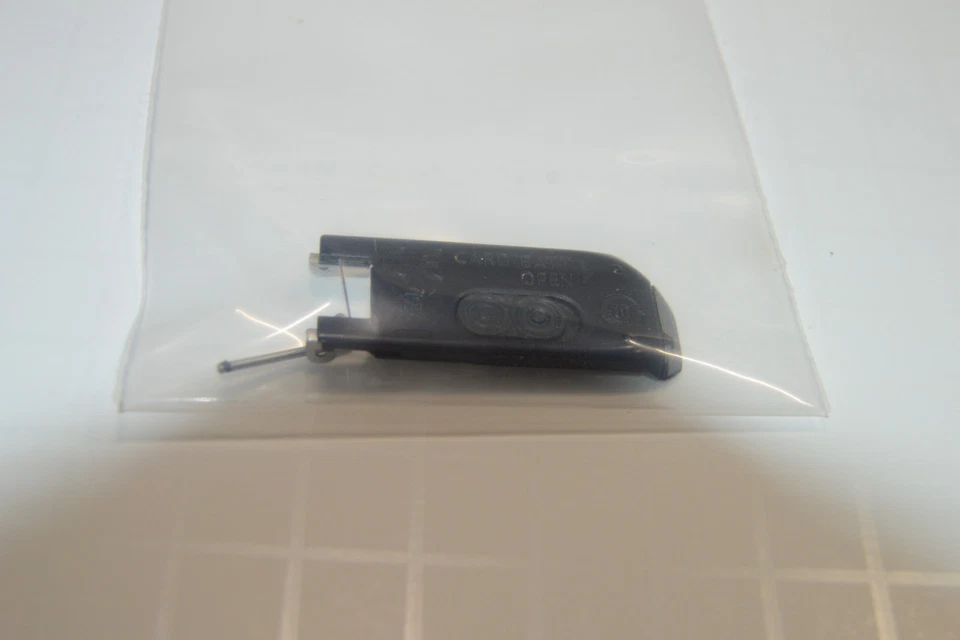 Battery Door with Pin/Spring for the Lens for Canon PowerShot SX210 IS SX230 HS - Image 1 of 2