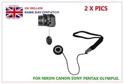 2 x Lens Cover Cap Keeper Holder For Nikon Canon Sony Pentax Fujifilm Panasonic - Image 1 of 4