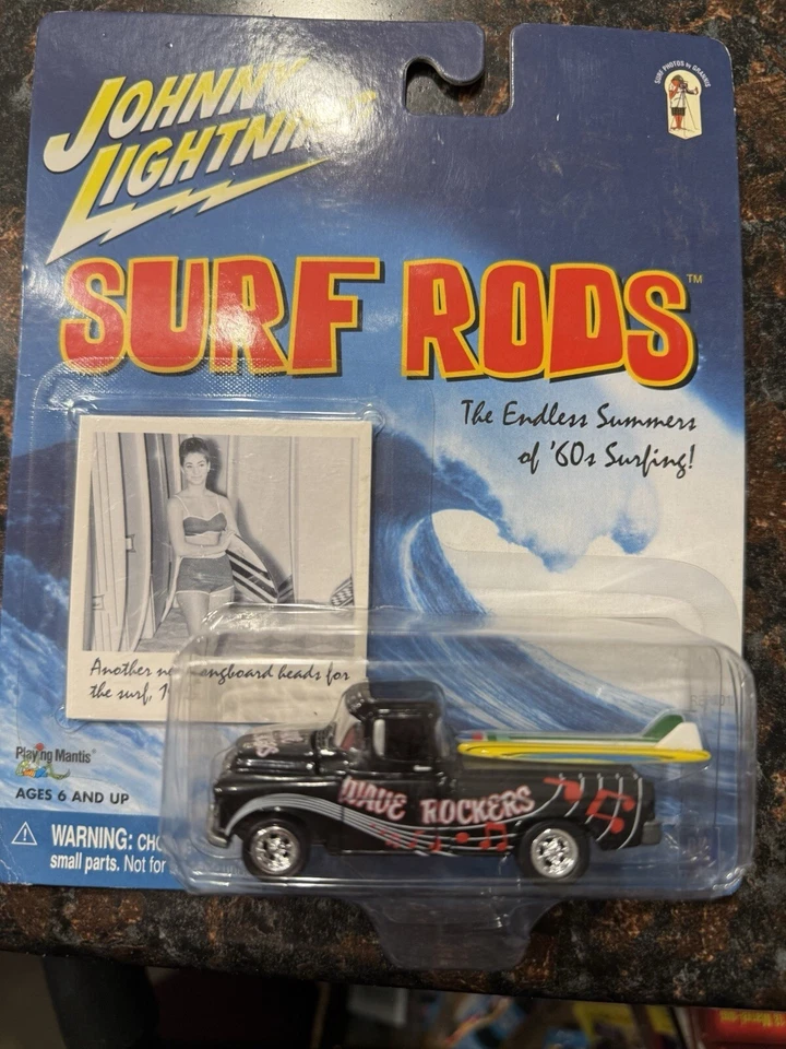 Camión camafeo Chevy Johnny Lightning Surf Rods Wave Rockers 1955 con tablas de surf 1/64 Foto 1 de 2