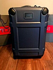 New TUMI Carry-on 4 Wheel Spinner Hard Case in Blue