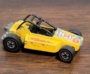 VINTAGE 1977 HOT WHEELS REDLINE ERA ROCK BUSTER  YELLOW  HK BASE w/ BLACKWALLS - Picture 1 of 4