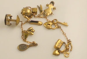 Vintage Brass Moveable Carousel Skate Teapot Scissors Heart Purse Charm Bracelet - Picture 1 of 3