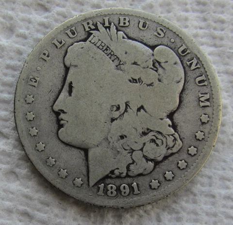 1891-CC Morgan Silver Dollar Rare Key Date Carson City Mint  Scratched Cover