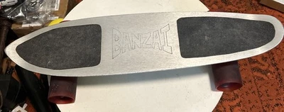 Monopatín vintage años 70 Banzai plateado aluminio Foto 1 de 4